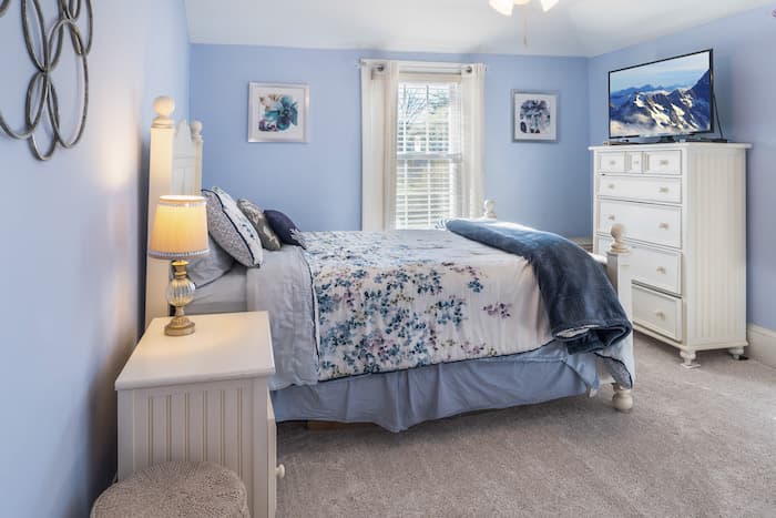 Wide angle photo of master bedroom